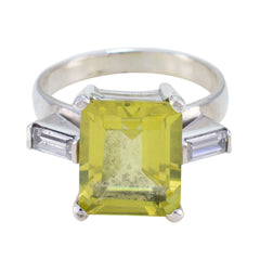 Mila yellow gemstone trilogy ring with a large square yellow gemstone and two smaller clear gemstones