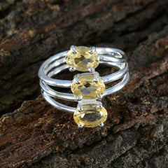 Julia yellow gemstone trilogy ring with three oval yellow stones set on a silver band