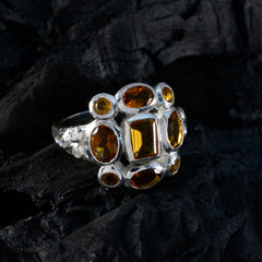 Ananya yellow navratna ring with multiple yellow gemstones set in silver band