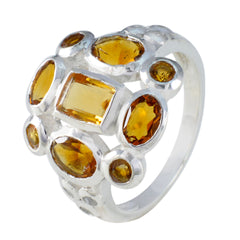 Ananya yellow navratna ring with multiple yellow gemstones set in a silver band