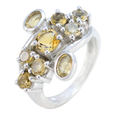 Putri silver yellow navratna ring with central round yellow gemstone and clustered oval and round stones