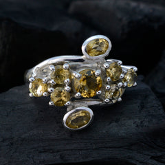 Putri yellow navratna ring with clustered oval and round yellow gemstones in polished silver band