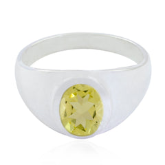 Ava silver ring featuring a yellow solitaire ring with an oval faceted yellow gemstone