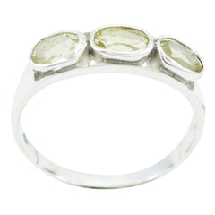 Putri yellow trilogy ring with three oval yellow gemstones set in a silver band