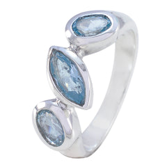 Laura artisan blue gemstone ring with three blue stones set in sterling silver band
