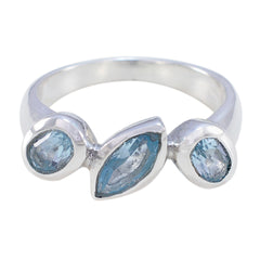 Laura artisan blue gemstone ring with three unique blue stones set in silver band