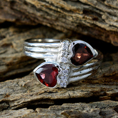 Daniela silver ring featuring an abstract red gemstone ring design with dual red stones and small accent crystals