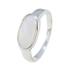 Ayesha white solitaire ring with oval moonstone bezel set in polished sterling silver band