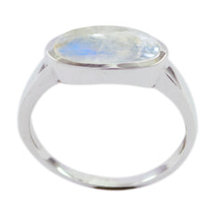 Ayesha white solitaire ring featuring oval moonstone cabochon set in polished sterling silver band