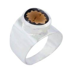Charlotte brown solitaire gemstone ring with a large faceted brown stone set in a wide silver band