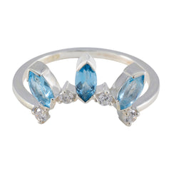 Josephine blue crown trilogy ring with three marquise blue gemstones and small clear stones on silver band