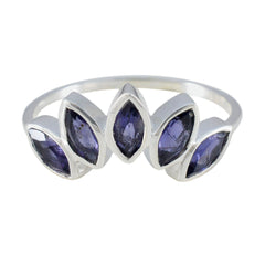 Claire blue gemstone crown ring with five marquise-shaped blue stones set in silver band