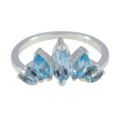 Eleanor blue gemstone crown ring with marquise cut blue stones set in silver band