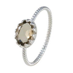 Marie Brown Solitaire Ring with Oval Gemstone