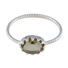 Marie Brown Solitaire Ring with Oval Gemstone