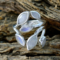 Freya silver leaf design gemstone ring with multiple marquise-shaped stones on rustic wood