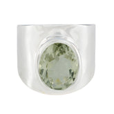 Angel light green solitaire ring with oval gemstone set in wide silver band