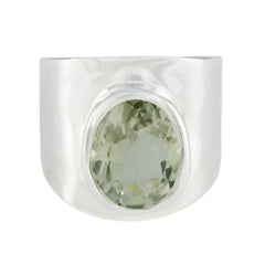 Angel light green solitaire ring with oval gemstone set in wide silver band