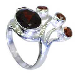 Nayara modern red gemstone ring with multiple red stones set in silver band