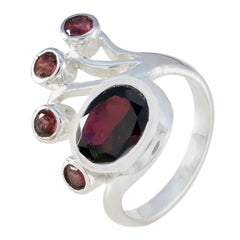 Nayara modern red gemstone ring with multiple red stones set in polished silver band