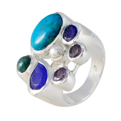 Emilia multicolor gemstone cocktail ring with turquoise, pearl, and purple stones in silver setting