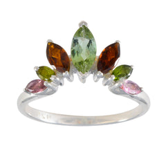 Mei multicolor gemstone crown ring with green, orange, pink, and yellow stones set in silver band
