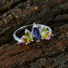 Min-seo multicolor gemstone crown ring with purple, green, yellow, and pink stones on silver band