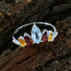 Lea multicolor gemstone crown ring with blue, red, and yellow stones on silver band