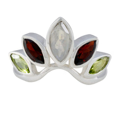 Nari multicolor gemstone crown ring with silver band and marquise cut stones in green, red, and white