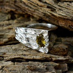 Nella multicolor gemstone solitaire ring with textured silver band on rustic wood background