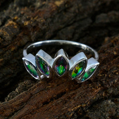 Hina silver band multicolor gemstone statement ring with five marquise-cut stones on rustic wood