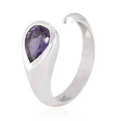Sofia purple solitaire ring featuring a pear-shaped purple gemstone set on an open silver band