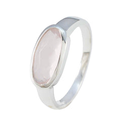 Soo-jin pink solitaire ring for women with oval rose quartz stone set in silver band