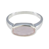 Soo-jin pink solitaire ring for women with oval faceted gemstone set in silver band