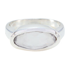 Soo-jin pink solitaire ring for women with smooth silver band and oval pink stone