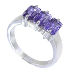 Nisa purple gemstone trilogy ring with three rectangular purple stones set in silver band