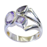 Saanvi purple gemstone trilogy ring with three unique shaped purple stones set in silver band