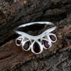Evelyn romantic red gemstone ring with multiple teardrop red stones set in silver band