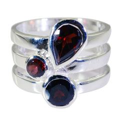 Paula statement red gemstone ring with three red stones in silver setting