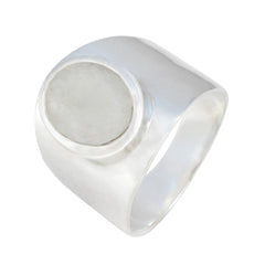 Gabriela white solitaire ring for women with a wide silver band and smooth round top design