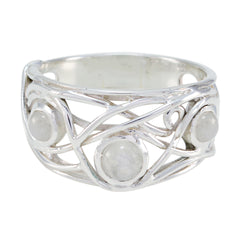 Laura white trilogy ring with intricate silver design and three round white stones
