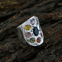 Liyana Navratna gemstone ring in sterling silver with central black stone and multicolored gems