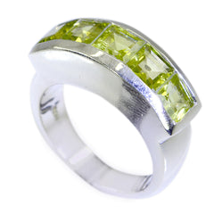 Rebeca green gemstone contemporary ring sterling silver channel set with three square peridot stones