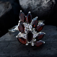 Aurora trendy red gemstone ring with marquise cut red stones and sparkling accents on silver band