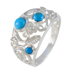 Meera silver ring with intricate floral design and blue stones turquoise trilogy ring