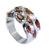 Emilia abstract red gemstone ring featuring multiple marquise-cut red stones in silver setting