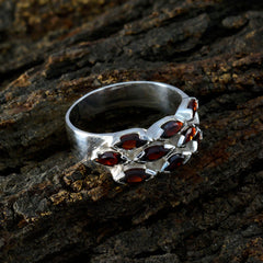 Emilia abstract red gemstone ring featuring multiple marquise-shaped red stones set in silver band