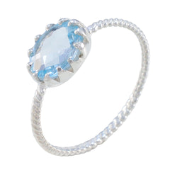 Grace Twist Blue Solitaire Ring Elegant Silver Band