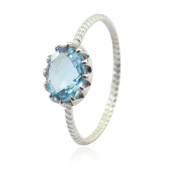 Grace Twist Blue Solitaire Ring Elegant Silver Band