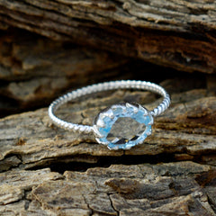 Grace Twist Blue Solitaire Ring Elegant Silver Band